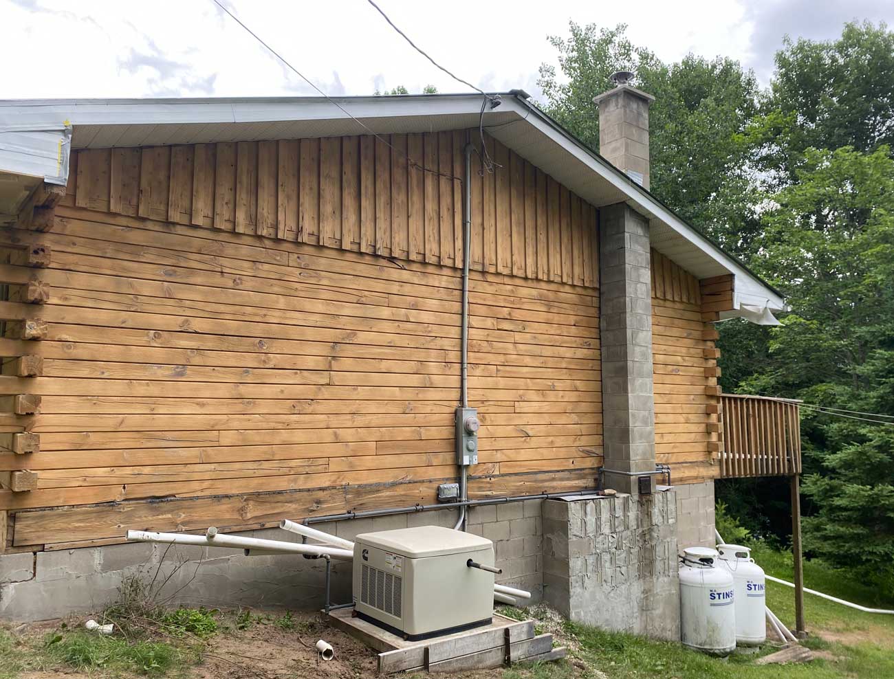 Log cabin after sandblasting. Wood is clean and new lookig